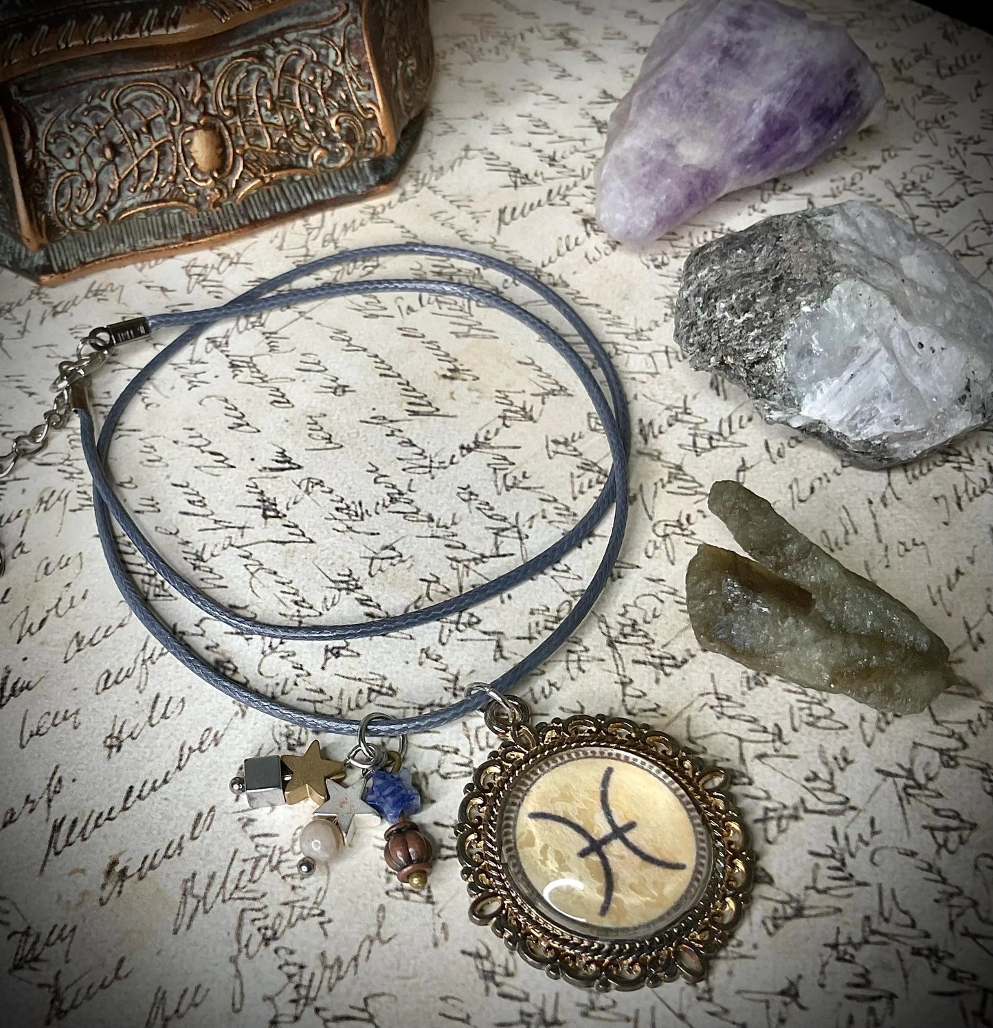 Pisces Glyph Amulet